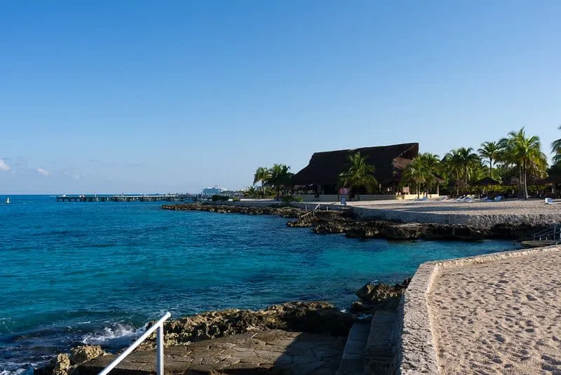 Chankanaab beach park on Cozumel with clear snorkeling water and rocky shore