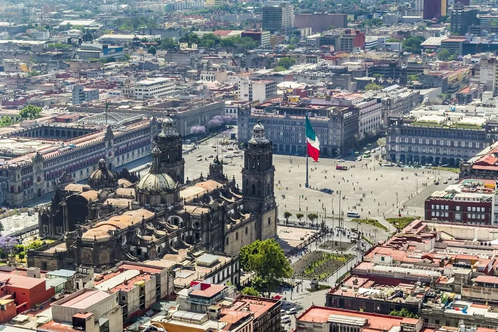 Mexico City Zocalo with the cathedral and large central flag