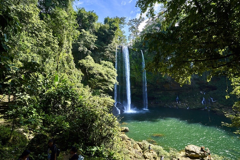 Misol-Há waterfall in Chiapas — a 35-meter cascade you can walk behind via a cave path, 22km from Palenque