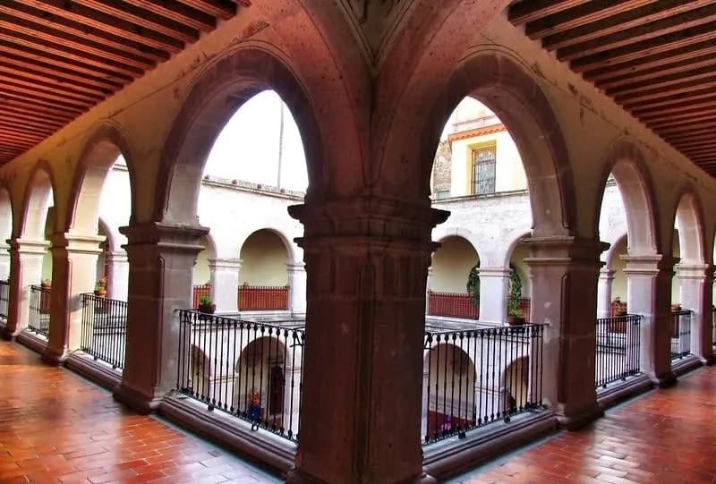Aguascalientes museum beside a central plaza during warm April fair season