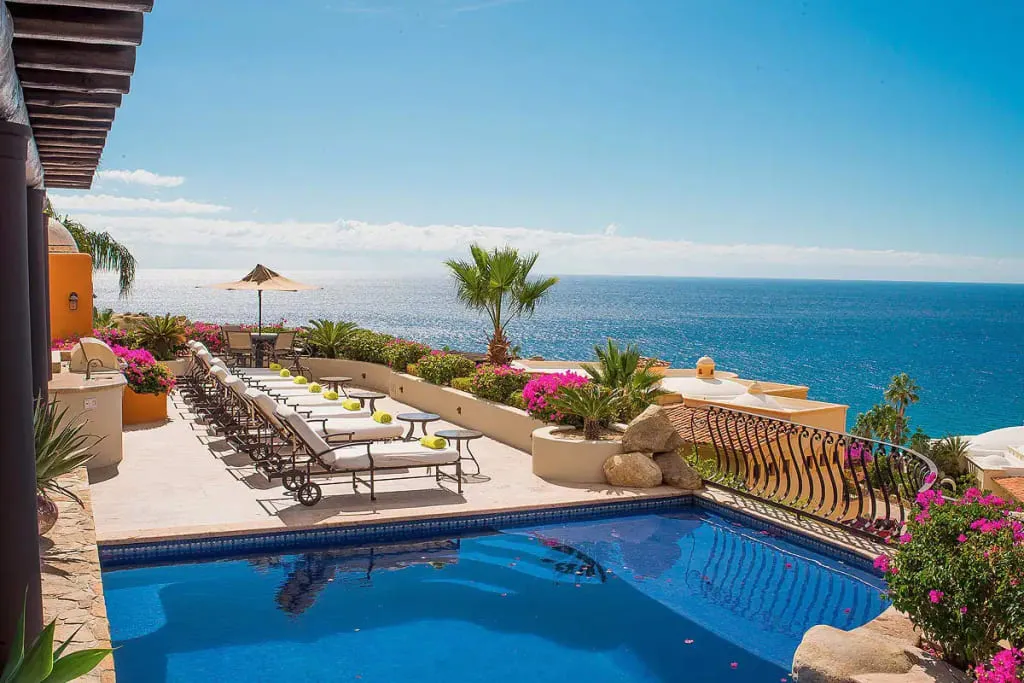 Cabo San Lucas villa terrace with ocean-view lounging areas