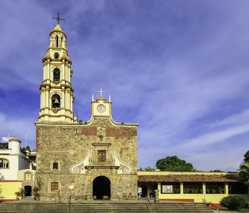Traditional Ajijic Mexico colonial architecture with colorful painted facades and cobblestone street