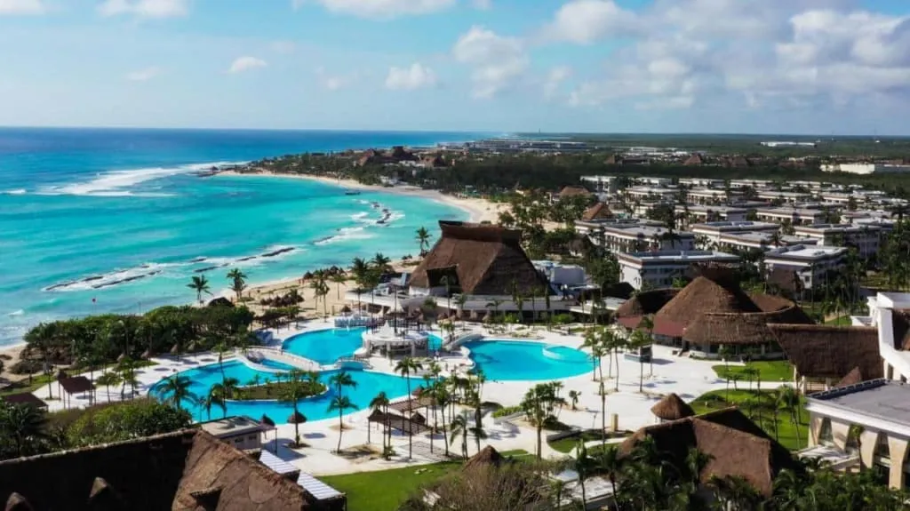 Grand Bahia Principe Tulum all-inclusive resort buildings and pool