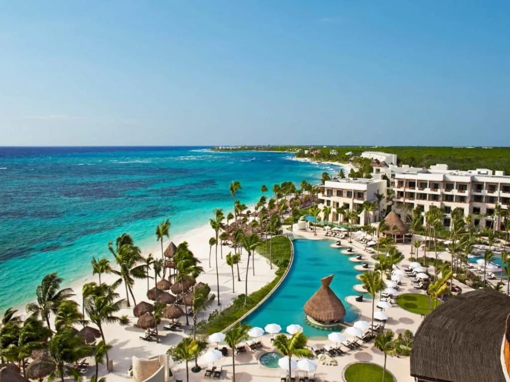 Secrets Akumal adults-only resort pool facing the Riviera Maya coast