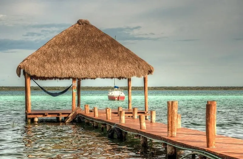 Quiet hotel terrace near the Bacalar lagoon during shoulder season