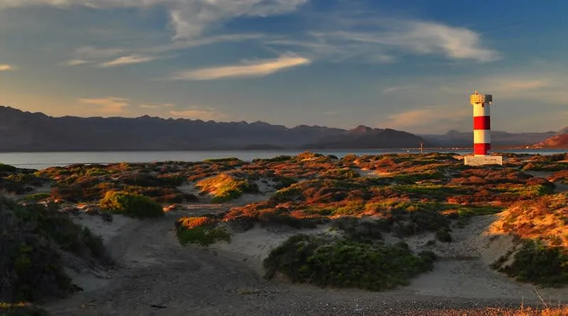 Rocky Baja desert hills dropping into the blue bay at Bahia de Los Angeles