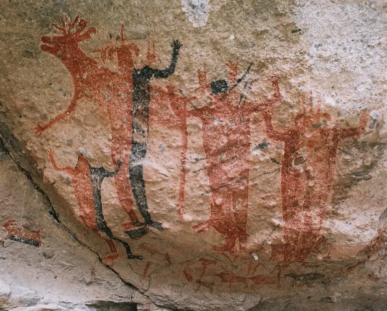 Ancient Montevideo cave paintings on a volcanic rock wall near San Borja