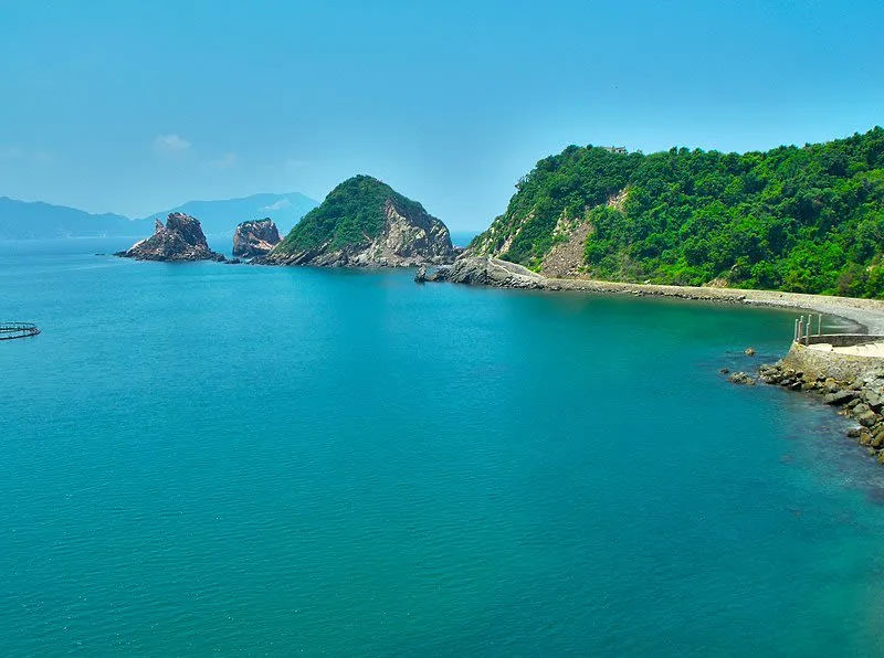 Aerial view of Barra de Navidad on the Costa Alegre — the narrow lagoon peninsula separating the Pacific beach from Melaque Bay