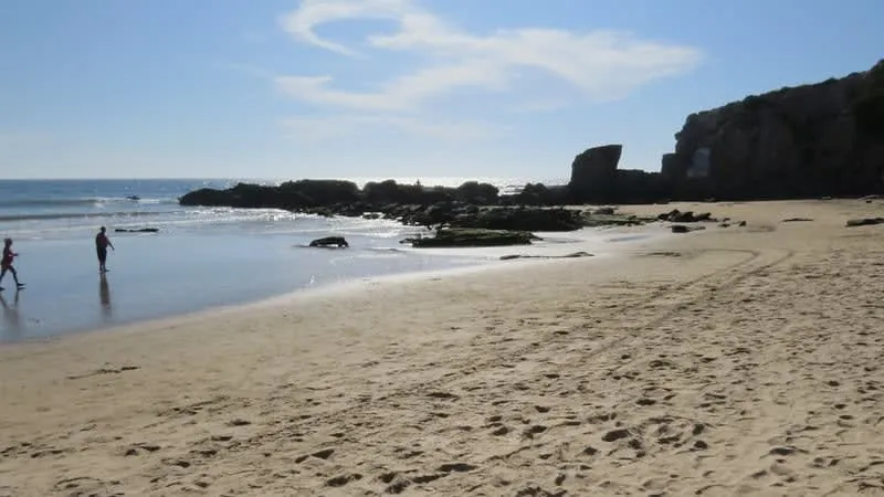 Cerritos Beach in Mazatlan with open Pacific surf and a wide sandy shoreline