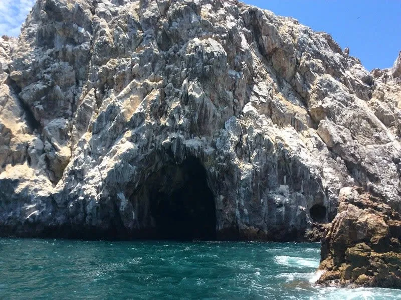 Stone Island beach near Mazatlán with Pacific sand and late-summer clouds
