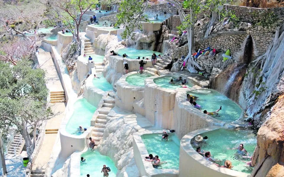 Cave interior at Grutas de Tolantongo Hidalgo — hot spring thermal tunnel with stalactites and mineral-rich water