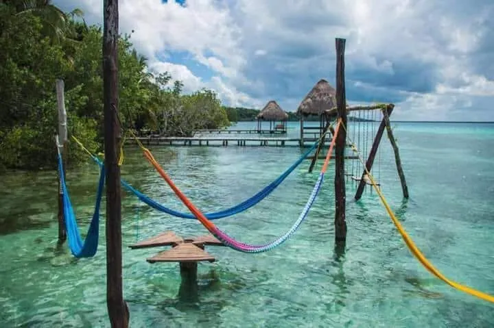 Eco-Romantic Villas Kuuch Kaanil palapa cabins by Bacalar Lagoon