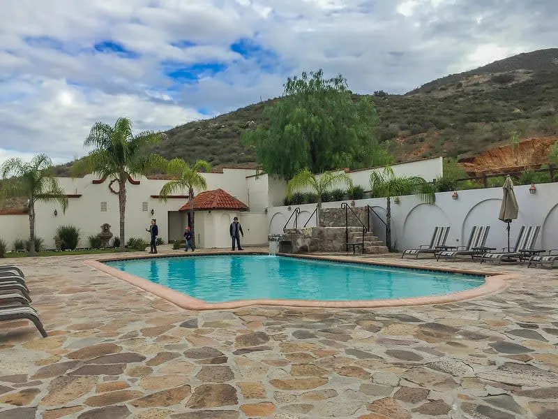 Hacienda Guadalupe boutique hotel terrace with vineyard views and outdoor swimming pool