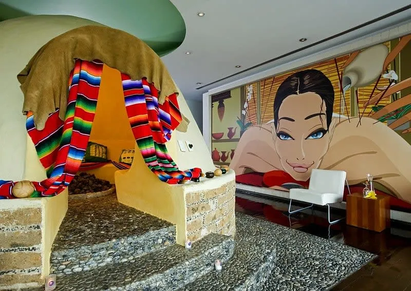 Away Spa treatment room at W Mexico City with modern lighting and massage beds