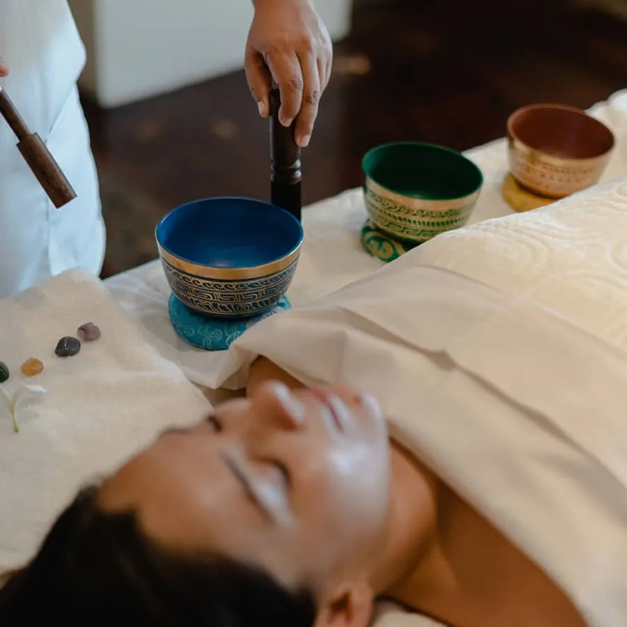 Stone treatment room at Espiritu Spa near La Paz with a massage table and rustic Baja decor