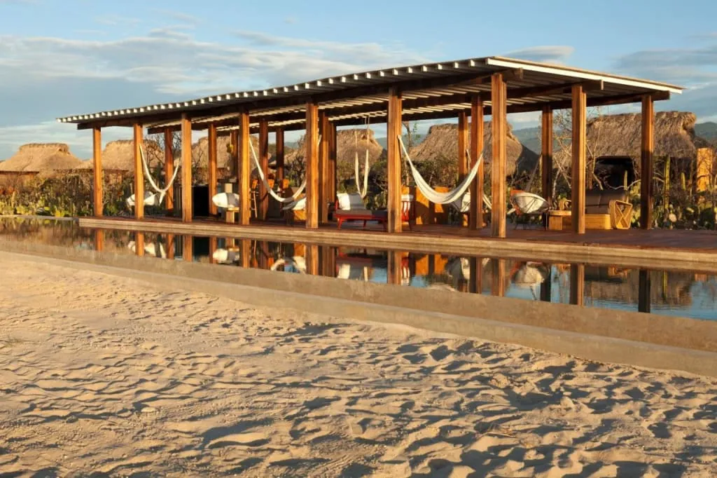 Hotel Escondido spa setting near Puerto Escondido with beachside cabanas and palms
