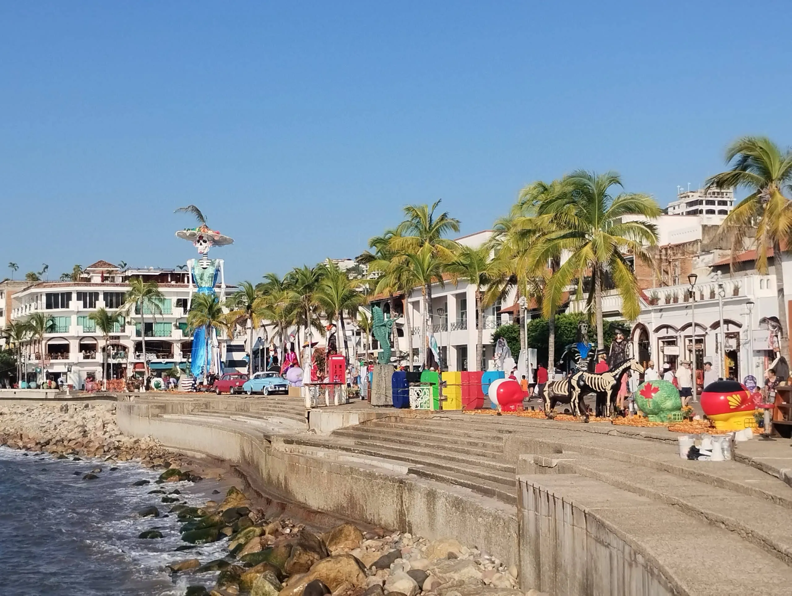 Puerto Vallarta boardwalk evening with tourists enjoying outdoor bars and cocktails