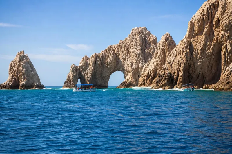 El Arco and tour boats off Cabo San Lucas during clear May weather