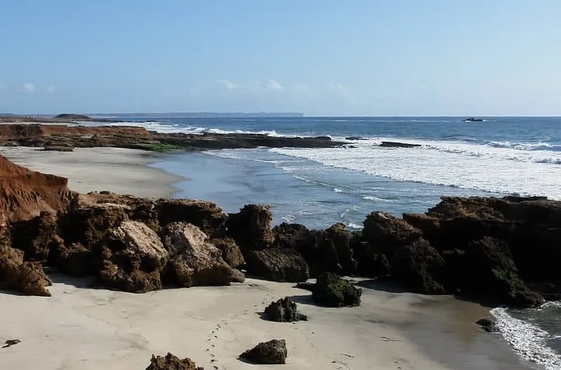 Rocky coastline and open Pacific ocean at Erendira Beach, Baja California