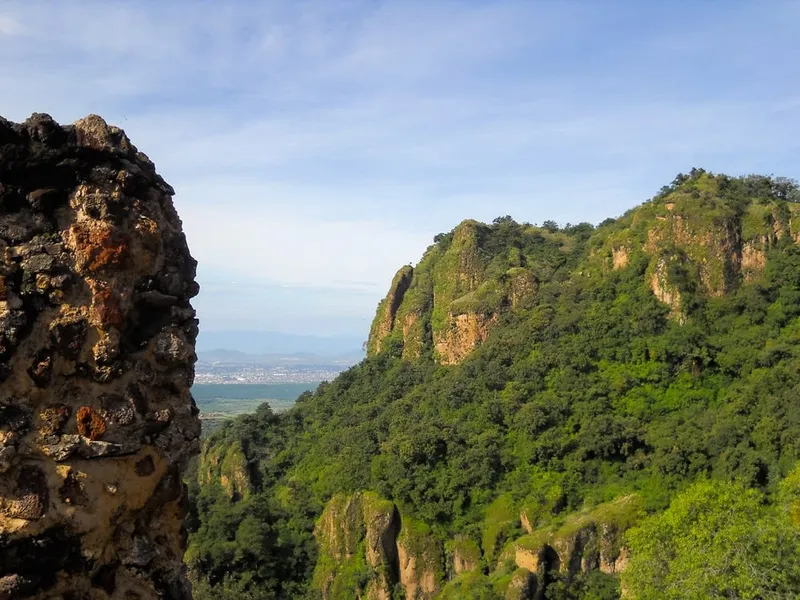 View of El Tepozteco pyramid atop mountain cliffs in Tepoztlán, Morelos