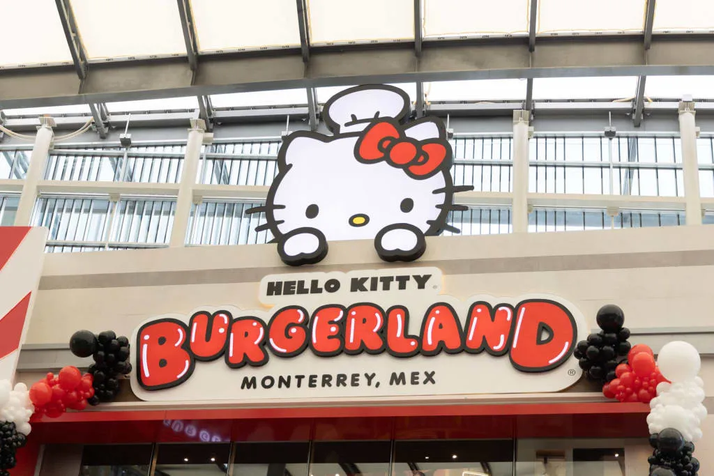 Hello Kitty themed restaurant interior with pink booths