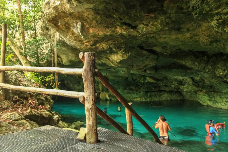 Cenote Dos Ojos near Tulum — crystal clear turquoise underground freshwater cavern in Quintana Roo Mexico