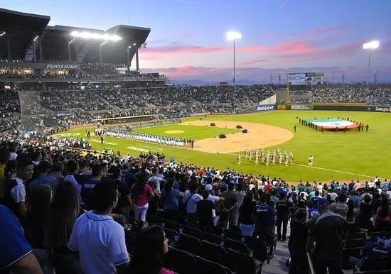 Night baseball game at Yaquis de Obregón stadium — a packed crowd under the lights