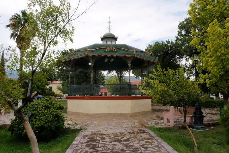 Plaza de Armas kiosk and garden paths beside the municipal palace