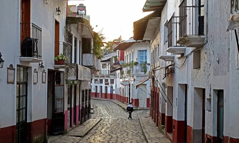 Misty Cuetzalan streets in November with damp stone lanes and cool mountain weather