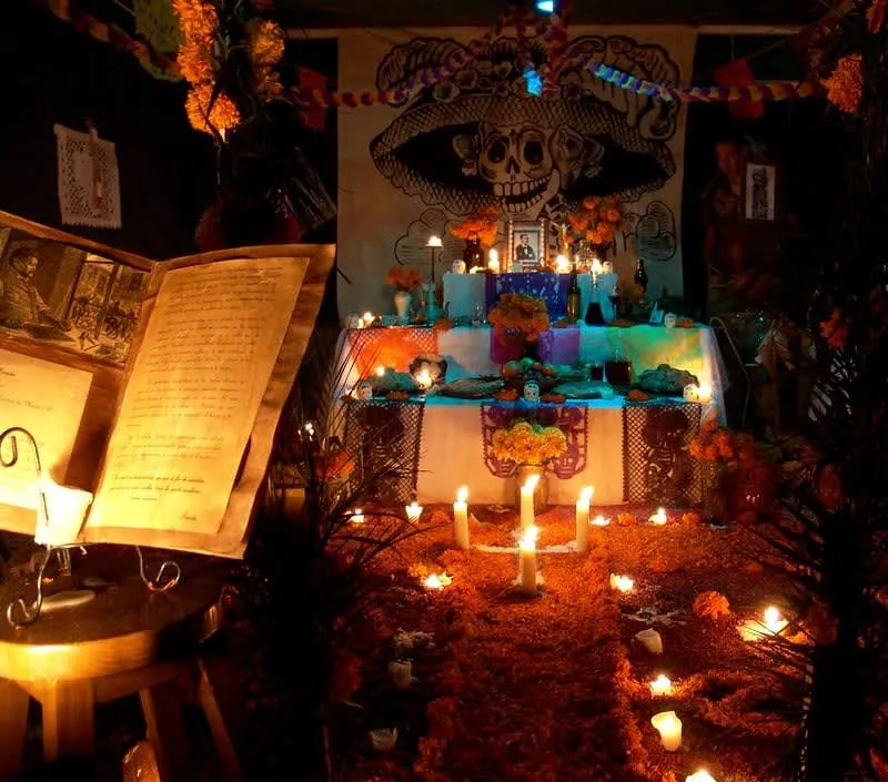 Traditional Day of the Dead altar with marigolds and candles in Oaxaca