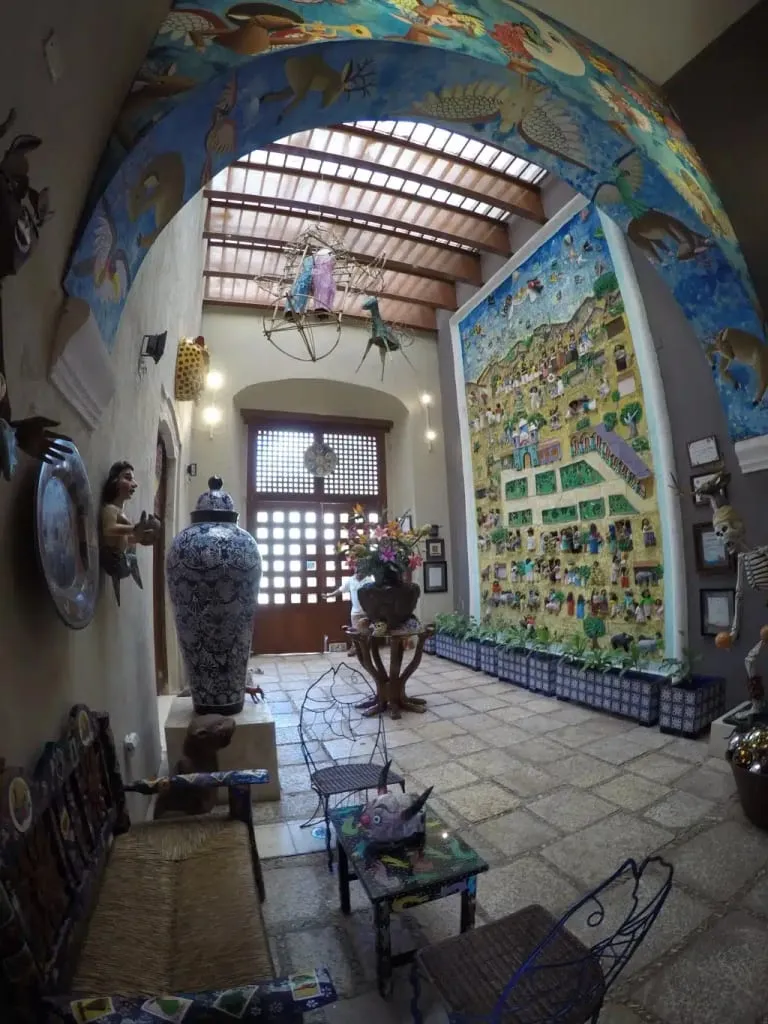 Mexican folk art display at Casa de los Venados in Valladolid