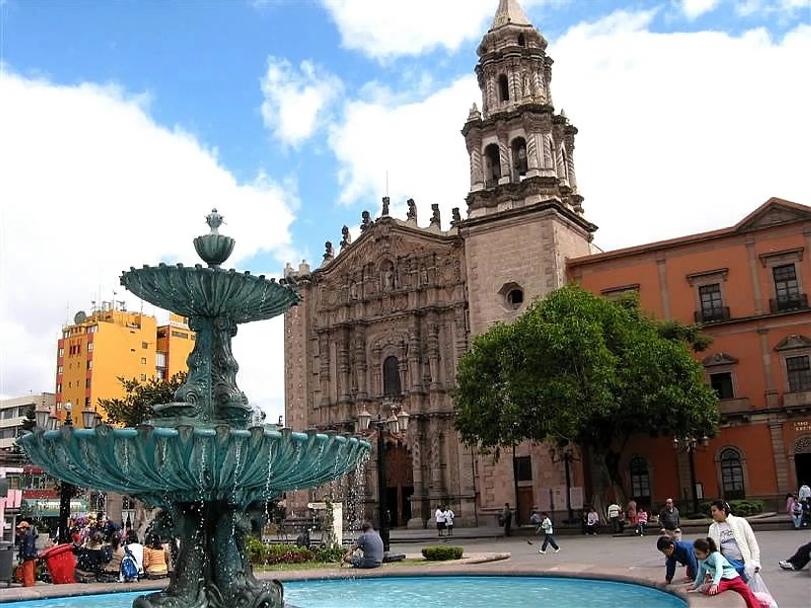Ornate Templo del Carmen facade rising above the historic center streets