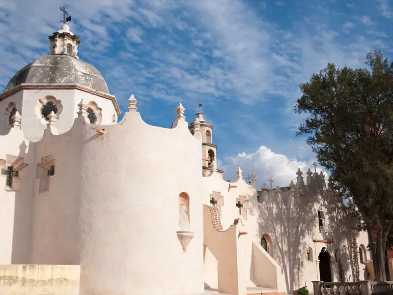 Sanctuary of Atotonilco UNESCO World Heritage Site Guanajuato — exterior of the 18th-century Jesuit shrine with its ornate stone facade, 15 km from San Miguel de Allende