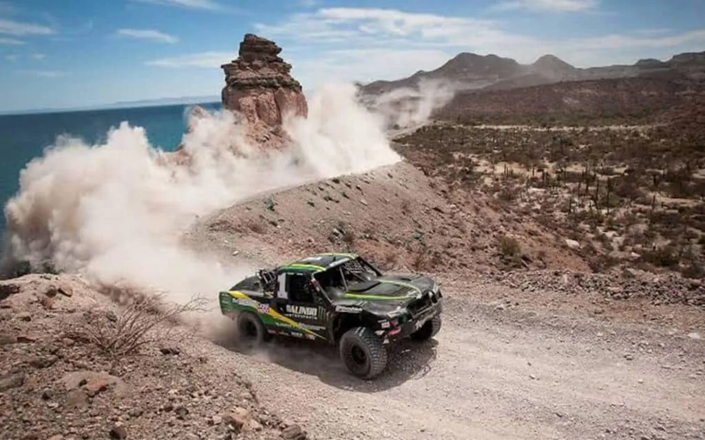 Off-road Baja California driving near Ensenada — dirt track through the chaparral landscape of northern Baja