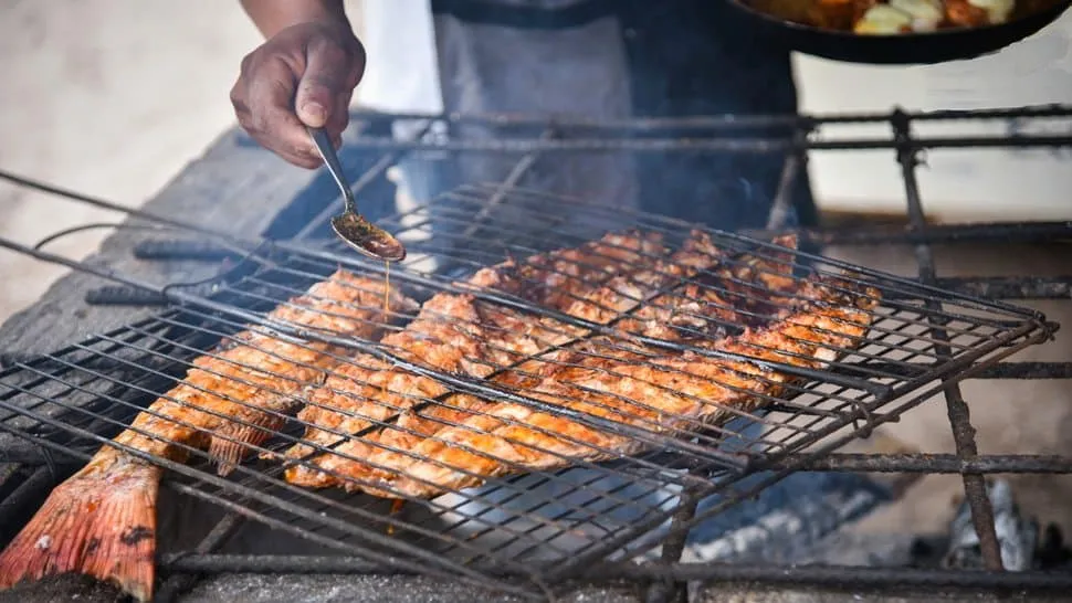 Zarandeado fish at Barra de Navidad — whole grilled red snapper with achiote marinade, the signature dish of the Jalisco coast