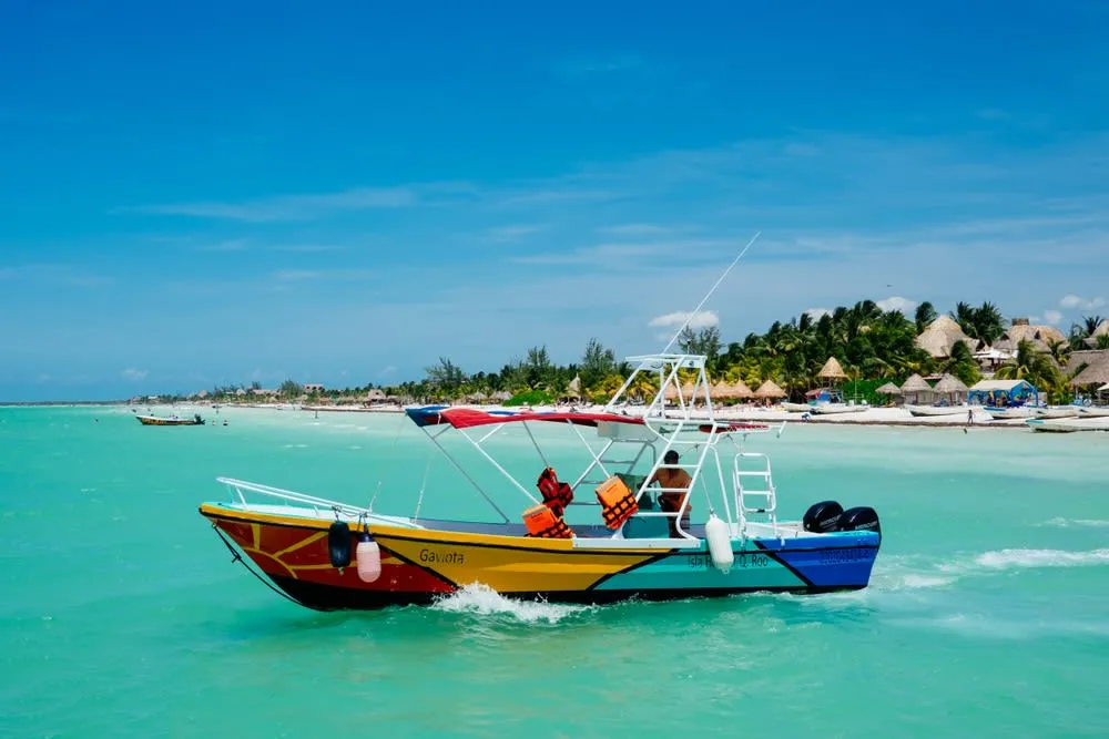 Holbox Island shallow-water fishing area near the beach at sunset
