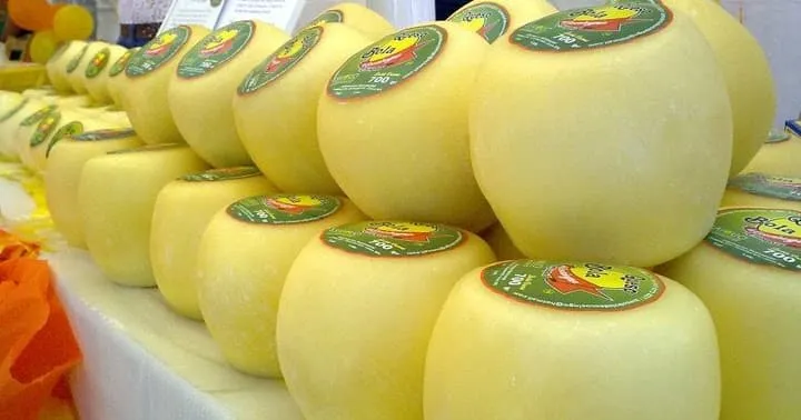 Queso bola de Ocosingo — the distinctive Chiapas ball cheese with a curd layer used for the stuffed version