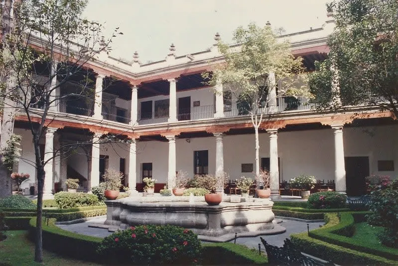 Franz Mayer Museum courtyard with colonial arches and garden seating