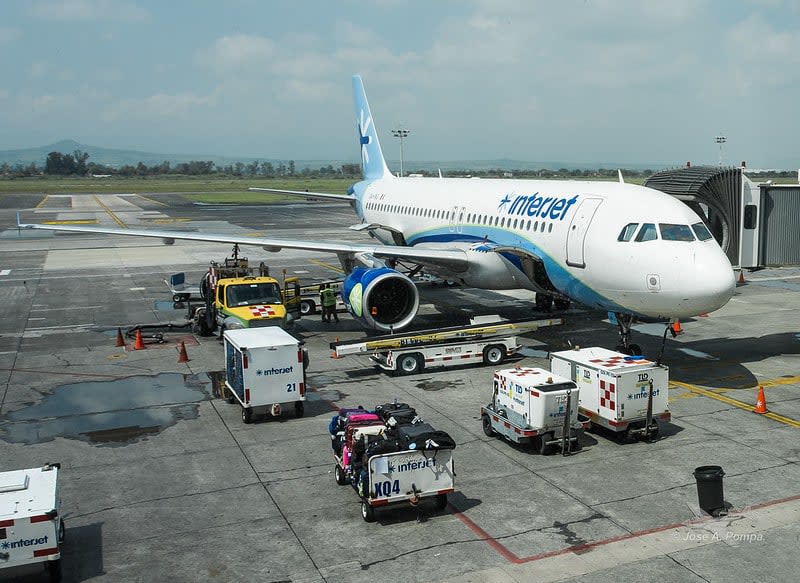 Guadalajara International Airport (GDL) departures hall — all flights to Oaxaca connect through Mexico City