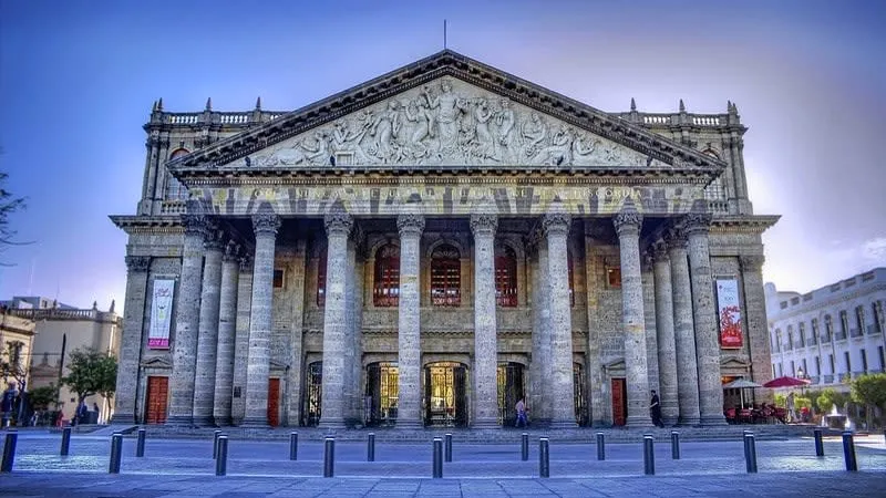 Guadalajara cathedral plaza in crisp dry-season light with families crossing the square