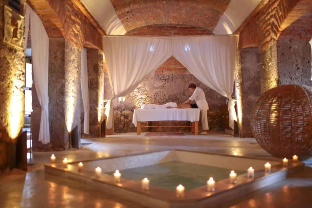 El Aventadero Spa inside Hacienda Sepulveda with old stone arches and hydrotherapy details
