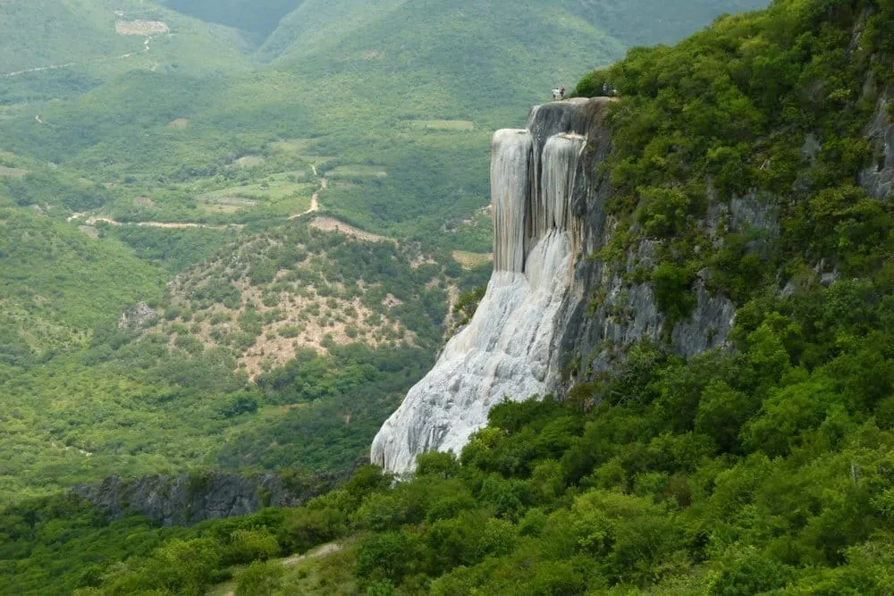 Hierve el Agua petrified waterfall cascading over limestone cliff above Oaxaca valley