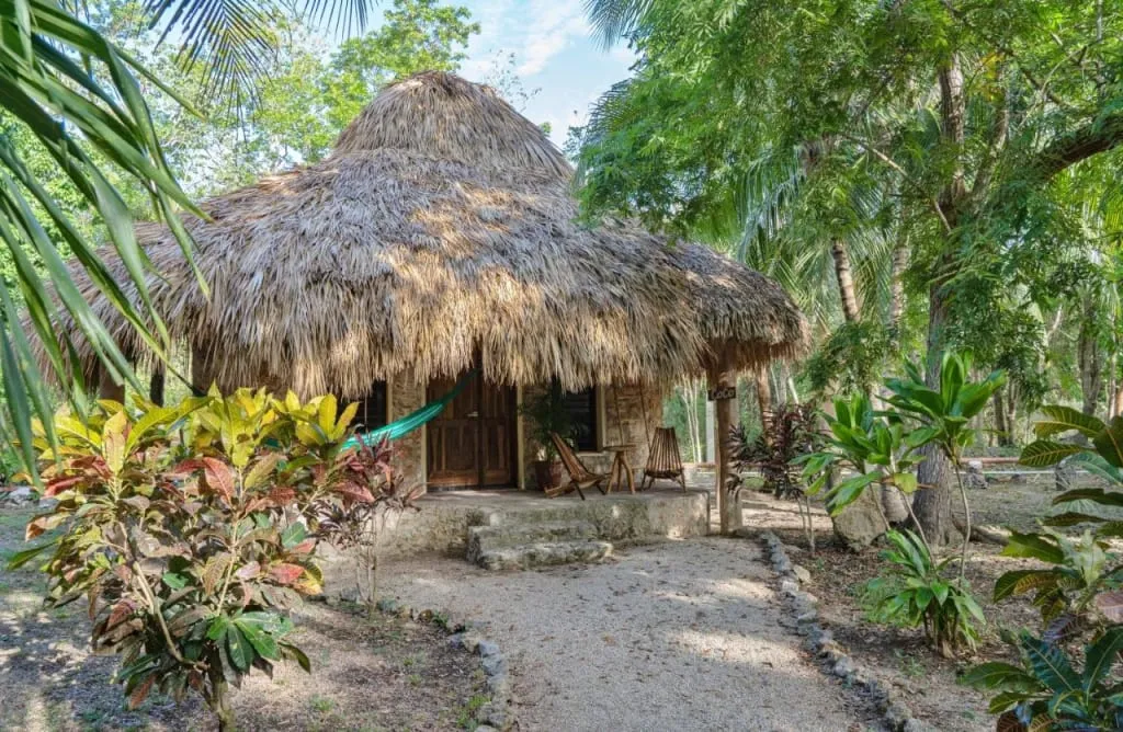 Ecotucan Villas cabins surrounded by tropical gardens in Bacalar