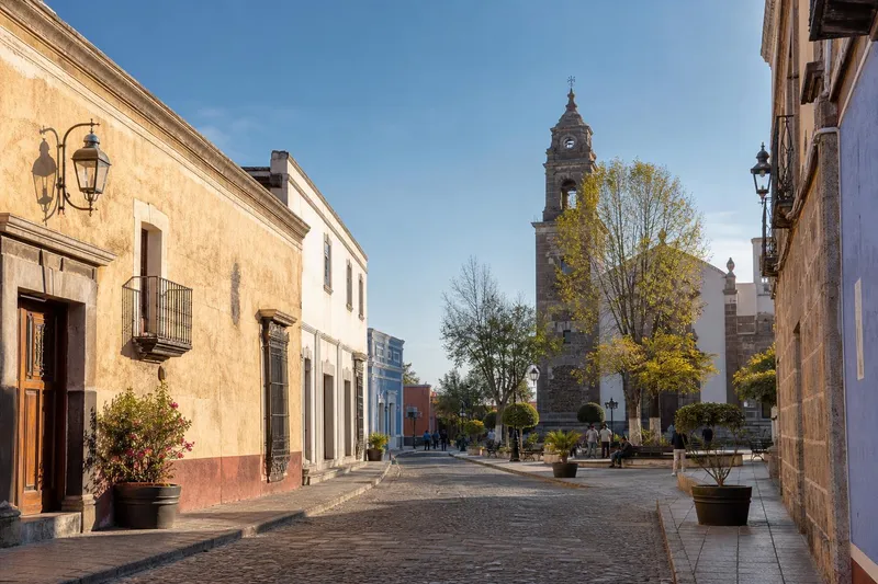 Warm April morning in Huamantla with Tlaxcala highland streets and church towers