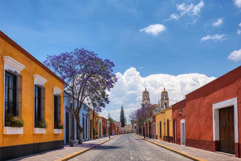 Warm May morning in Huamantla with Tlaxcala highland streets and church towers