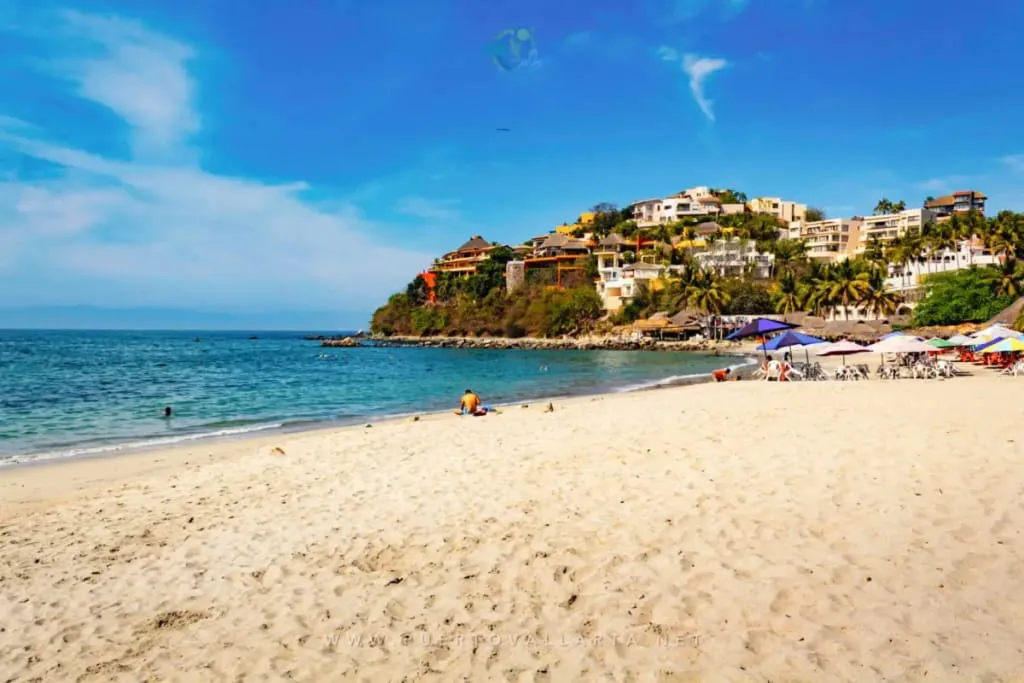 La Manzanilla beach at La Cruz de Huanacaxtle with palapas on the sand