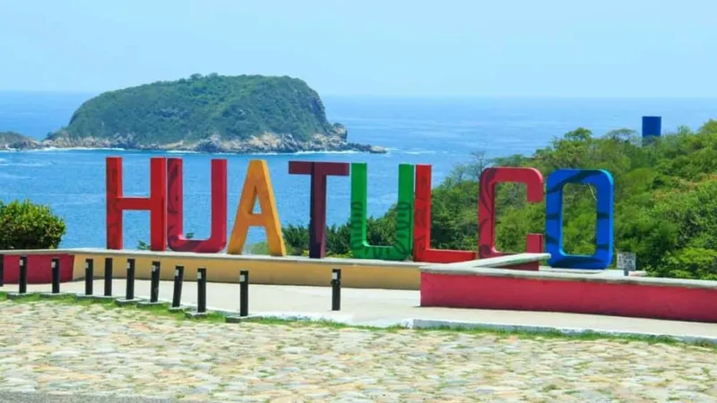 Playa Chahue in Huatulco, Oaxaca, with clear turquoise water and sand