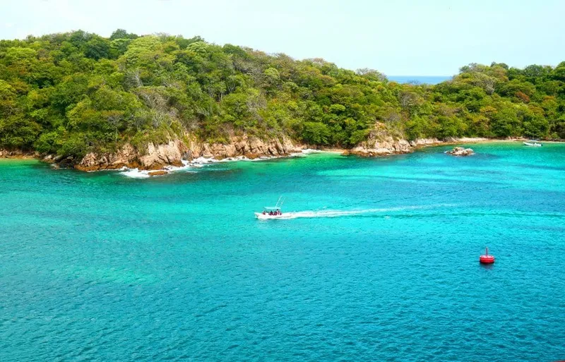 Santa Cruz Bay in Huatulco for a warm November swimming and boat-tour day