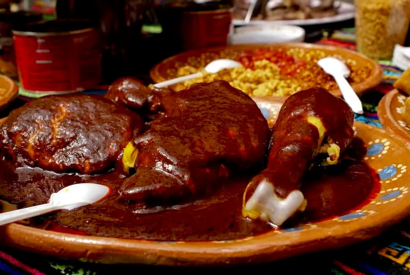 Chicken enchiltepinado and mole-style sauce from Huauchinango