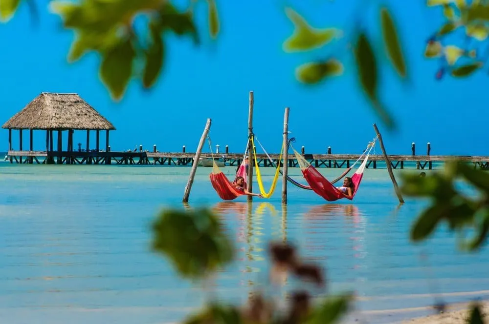 Wide sandy beach on Holbox used for comparing Isla Mujeres and Holbox